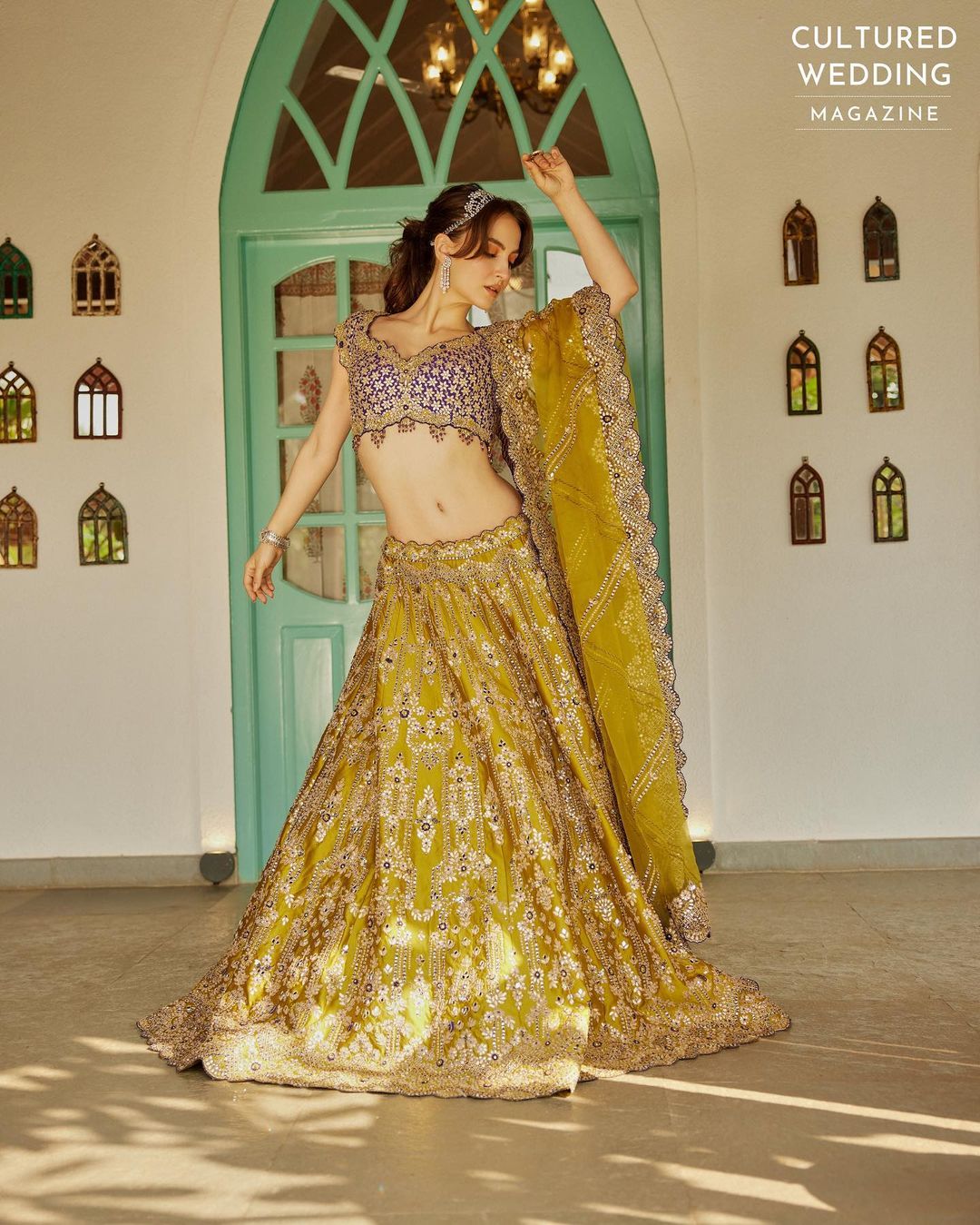 Bollywood Actress Elli AvrRam Images in Green Lehenga Choli